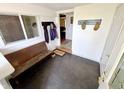 Bright foyer with coat racks, a bench, and a welcoming atmosphere at 725 N State Road 75, Lebanon, IN 46052