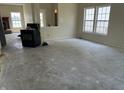 Spacious living room with lake view and a large window at 847 Sylvan St, Whiteland, IN 46184