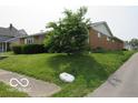 Exterior image of a well-kept brick house with tidy landscaping at 1333 S B St, Elwood, IN 46036