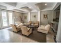 Relaxing community room with comfortable armchairs and a coffered ceiling at 355 E Ohio St # 211, Indianapolis, IN 46204
