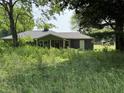 Charming single-story home featuring an unfinished front yard at 4633 S County Road 500 E, Plainfield, IN 46168
