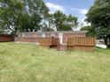 Backyard with a wooden deck and a view of the home's exterior at 5667 Broyles Rd, Avon, IN 46123