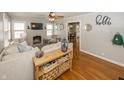 Comfortable living room with hardwood floors and ample natural light at 5829 Indianola Ave, Indianapolis, IN 46220