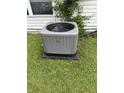 Rheem air conditioner for the home's central air, sitting on a slab outside the home at 982 Ramsgate Rd, Greenwood, IN 46143