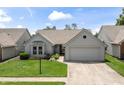 Charming single-Gathering home with a well-manicured lawn and attached two-car garage at 10753 Seaview Ln, Indianapolis, IN 46236