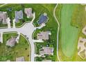 Stunning aerial view of a neighborhood located adjacent to a golf course at 4434 Hickory Ridge Blvd, Greenwood, IN 46143