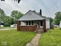 Charming home with a inviting front porch, brick accents and cozy appeal at 313 S Brittain Ave, Muncie, IN 47303