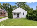 Charming home exterior with freshly cut grass, a well-kept lawn and classic design at 4310 Crittenden Ave, Indianapolis, IN 46205