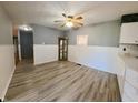 Dining area with wood-look floors, neutral walls, and a ceiling fan at 771 Doran Ave, Shelbyville, IN 46176