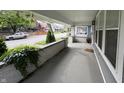 View of the home's front porch overlooking the neighborhood at 917 N Rural St, Indianapolis, IN 46201