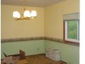 Traditional dining room with view to backyard at 1808 Orchid Ct, Indianapolis, IN 46219