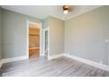 Spacious living room featuring modern flooring, neutral paint, and ample natural light at 410 Plum St, Frankton, IN 46044