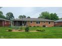 Spacious backyard with well-maintained lawn and storage shed at 420 Brookside Ln, Plainfield, IN 46168
