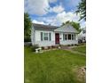 Charming single-story home with a well-maintained lawn and stone landscaping at 472 N 17Th St, Noblesville, IN 46060