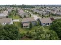 An aerial view showing this home in a well-maintained neighborhood with manicured lawns at 5917 Bartley Dr, Noblesville, IN 46062