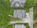 Aerial view showcasing the roof, yard, and surrounding neighborhood at 113 N Munsie St, Indianapolis, IN 46229