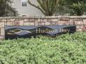 Stone sign for Hudson Bay at Southern Dunes, surrounded by lush green bushes at 2734 Newaygo Dr, Indianapolis, IN 46217