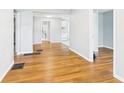 Hallway featuring hardwood floors and neutral walls at 4025 Main St, Anderson, IN 46013