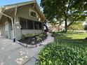 Beautifully landscaped front yard with a charming walkway leading to the cozy home at 5786 N Delaware St, Indianapolis, IN 46220