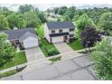 Lovely home with attached two-car garage and beautiful landscaping and a long drive at 15460 Follow Dr, Noblesville, IN 46060