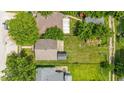 An eye-level aerial view of the neighborhood showing the property's roof and backyard at 3251 Mars Hill St, Indianapolis, IN 46221