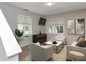 Bright living room featuring neutral tones, modern decor, and natural light at 6920 Wesley Ct, Indianapolis, IN 46220