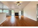 Bright living room with vaulted ceilings, hardwood floors and fireplace at 3327 Boxwood Dr, Indianapolis, IN 46227