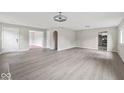 Bright and open living room with fresh paint, new flooring, and neutral decor at 508 W 38Th St, Indianapolis, IN 46208