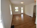 Bright and airy living room with hardwood floors and plenty of natural light at 5430 E 17Th St, Indianapolis, IN 46218