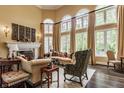 Bright and airy living room with a fireplace, hardwood floors, and plenty of natural light at 1089 Laurelwood, Carmel, IN 46032
