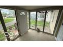 Sunroom offers multiple windows and an exterior door at 252 Ringwood Way, Anderson, IN 46013