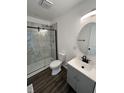 Stylish bathroom featuring a glass-enclosed shower, modern vanity, and sleek fixtures, provides a spa-like experience at 3201 W 22Nd St, Indianapolis, IN 46222