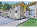 Inviting front entrance with brickwork, leading to a bright, airy foyer at 3265 Tulip Dr, Indianapolis, IN 46227