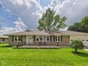 Charming single-story home featuring a cozy front porch and an attached garage at 3809 N Glenwood Ave, Muncie, IN 47304
