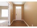 Light filled entryway with a hardwood floor and front door view at 6610 Aberdeen Dr, McCordsville, IN 46055