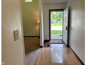 Bright entryway with tile flooring and view into carpeted living space at 7042 Colita More Ct, Indianapolis, IN 46254