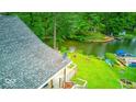Scenic aerial view showing the house with backyard access to the tranquil lake at 8635 S Providence Dr, Nineveh, IN 46164