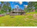 Two-story home with spacious back deck perfect for outdoor entertaining and relaxing at 8635 S Providence Dr, Nineveh, IN 46164