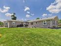 Spacious backyard featuring a patio area, perfect for outdoor dining and entertaining at 4511 W 300 S, Anderson, IN 46011