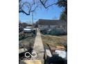 Exterior shot of a messy backyard with broken pool at 2519 N A St, Elwood, IN 46036