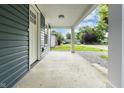 Inviting covered front porch, perfect for enjoying the outdoors at 3562 E Morris St, Indianapolis, IN 46203
