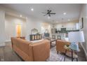 Open-concept design showcases the living room connected to the dining area and a modern kitchen at 5511 E University Ave, Indianapolis, IN 46219