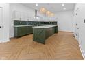 Stylish kitchen with an island, new appliances, and plenty of counter space at 206 N Beville Ave, Indianapolis, IN 46201