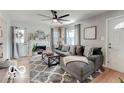 Comfortable living room featuring modern furnishings, area rug, and ample seating at 5363 Primrose Ave, Indianapolis, IN 46220