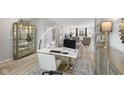 A modern home office featuring a marble desk and stylish decor at 5723 Arctic Run Dr, Noblesville, IN 46062