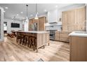 Well-lit kitchen featuring a large island and stainless steel appliances at 545 Fletcher Ave, Indianapolis, IN 46203