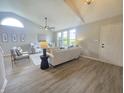 Bright living room with vaulted ceilings, modern furnishings, and ample natural light at 6369 Kelsey Dr, Indianapolis, IN 46268