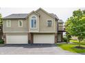 Charming two-story condo with two car garage and private balcony at 7685 River Rd, Indianapolis, IN 46240
