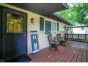 Inviting front porch with comfortable seating, perfect for relaxing outdoors at 9042 Panorama Ct, Indianapolis, IN 46234