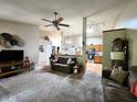 Open concept living area with seamless flow into the kitchen, perfect for entertaining at 1223 Long Shore Dr, Indianapolis, IN 46217